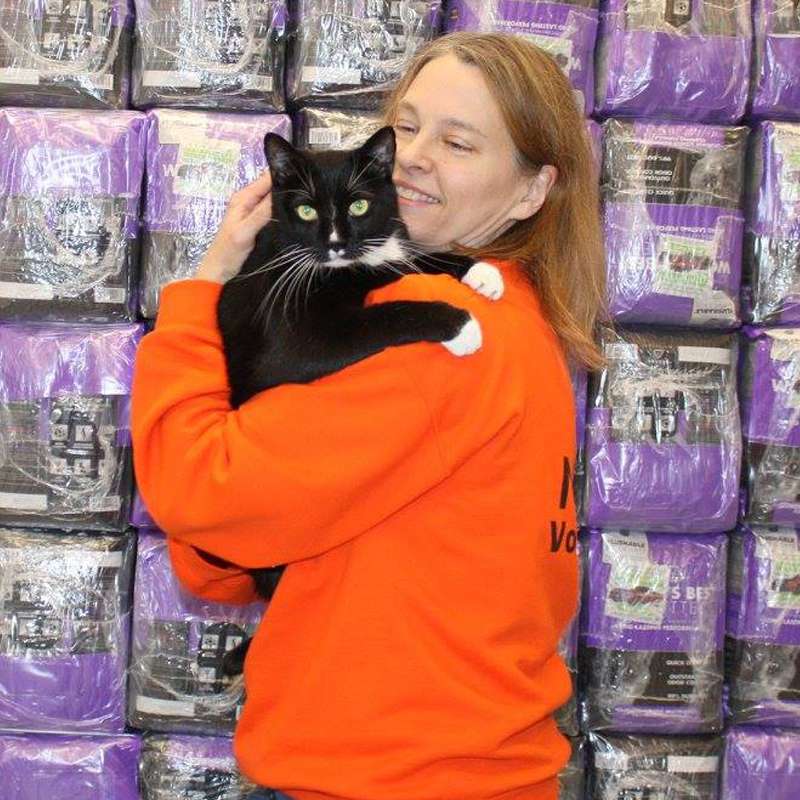 Woman holding cat