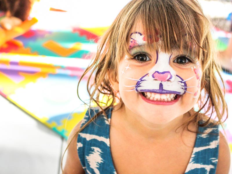 Ways to Help Shelters: Host a party, girl with face painted like cat